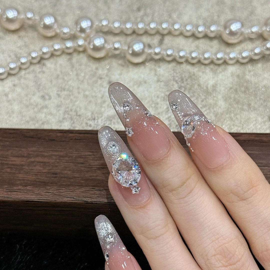 Artificial artificial nails with luxurious glitter and rhinestone design Bowlift