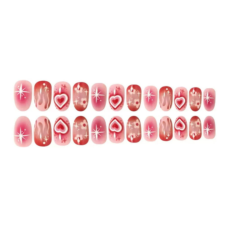 Artificial nail set with romantic heart design and sparkling accents Bowlift