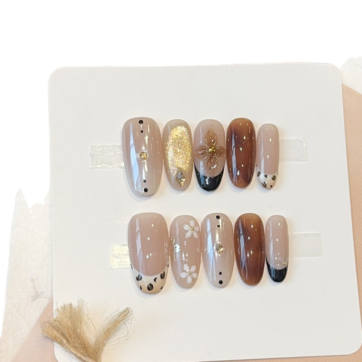 Artificial Nails in Elegant Pastel Look with Floral Accents Bowlift