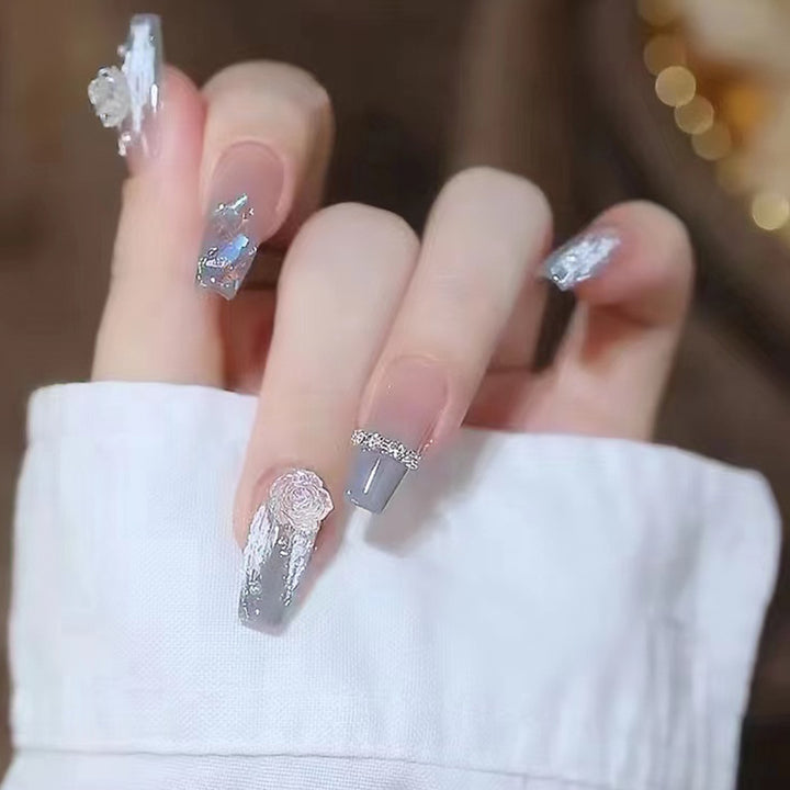 Artificial nail set with delicate rose and glitter decorations Bowlift