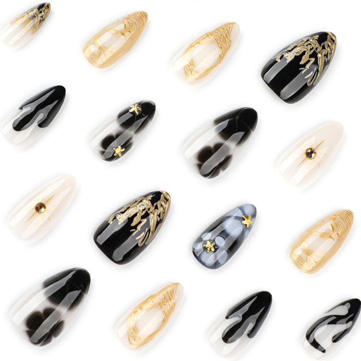 Elegant Stiletto Artificial Nails with Gold Accents and Modern Designs Bowlift