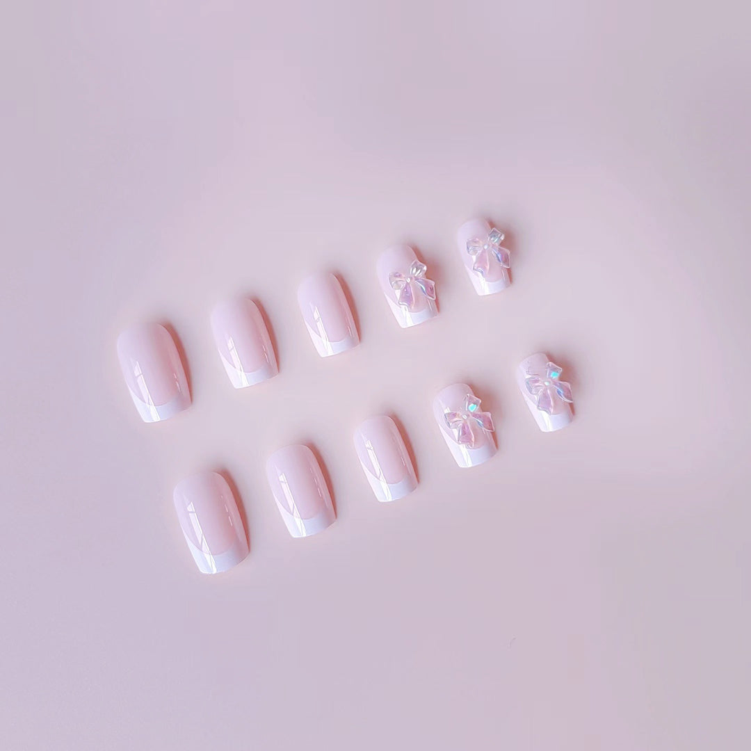 Acrylic nail set with elegant French tips and 3D details Bowlift