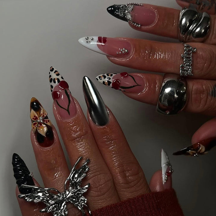 Artful Stiletto Fingernails with Unique Design Elements Bowlift
