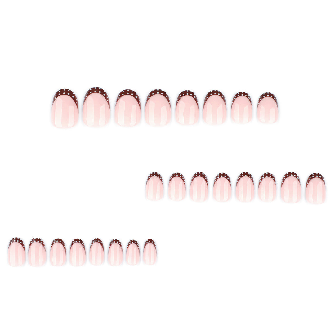Artful nail design with elegant French tip and accents Bowlift