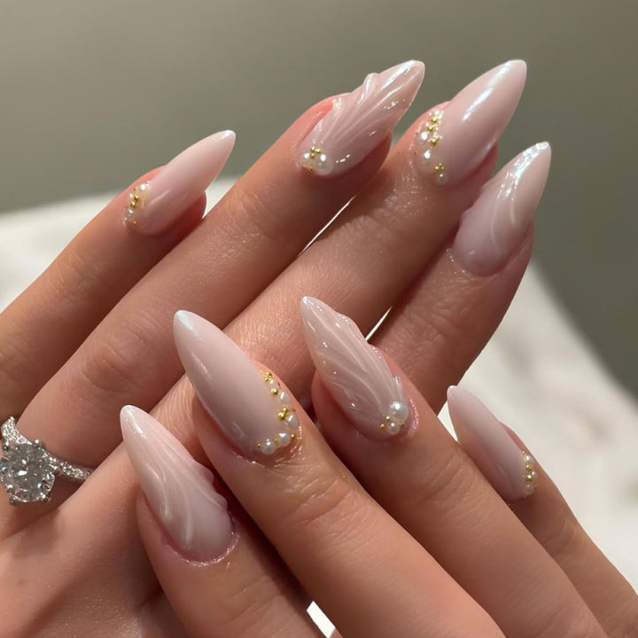 Elegant nail art in maritime design with glitter and 3D accents Bowlift