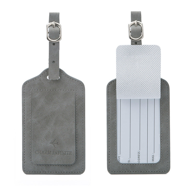 vintage leather luggage tag with transparent ID window and adjustable buckle strap Bowlift