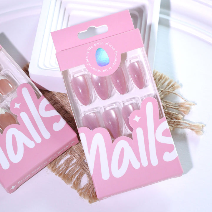 Artificial nail art with glitter embellishments Bowlift