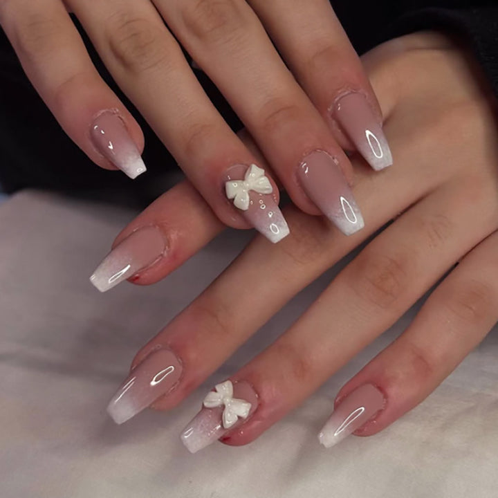 Artful acrylic nails with elegant butterfly design Bowlift