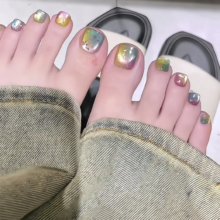 Acrylic nail set with shimmering gradient and elegant designs Bowlift