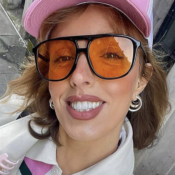 Women's fashionable sunglasses in transparent design with colored lenses Bowlift