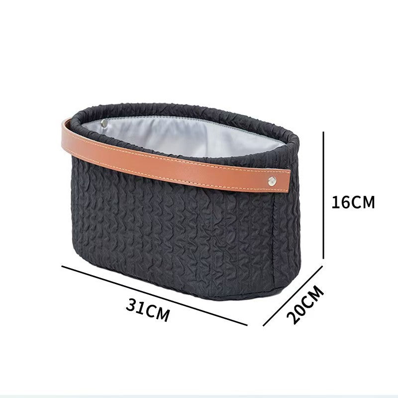 Elegant storage basket with faux leather handle