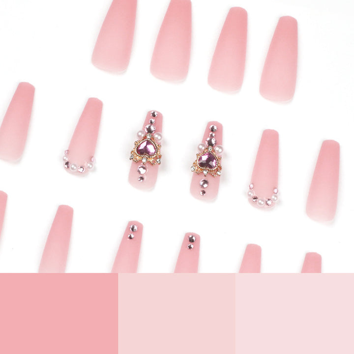 Creative artificial nails with heart-shaped decorative accents Bowlift