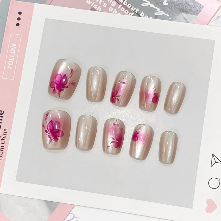 Artificial nail tips with floral accents Bowlift