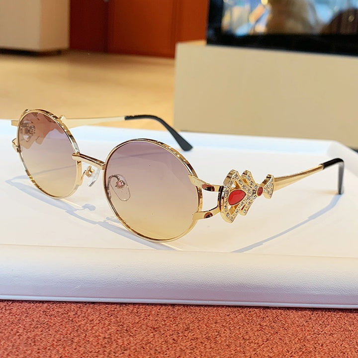 Ladies elegant rectangular sunglasses with glamorous embellishments Bowlift