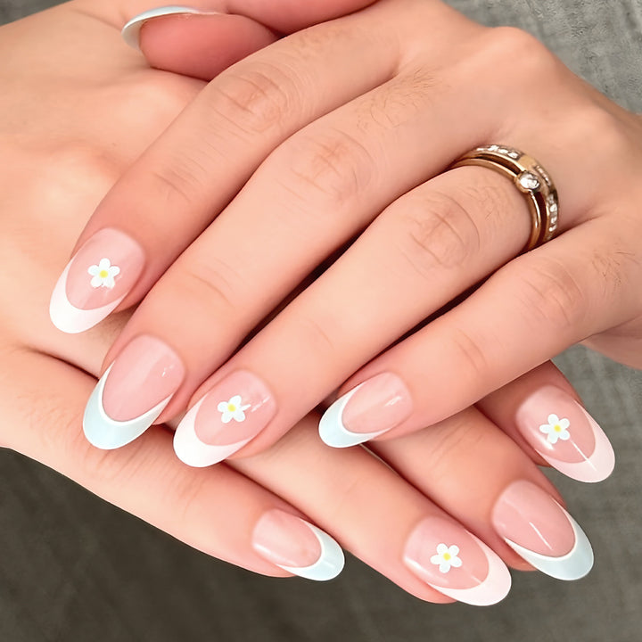 Elegant French Tip Press-On Nails with Floral Accents Bowlift