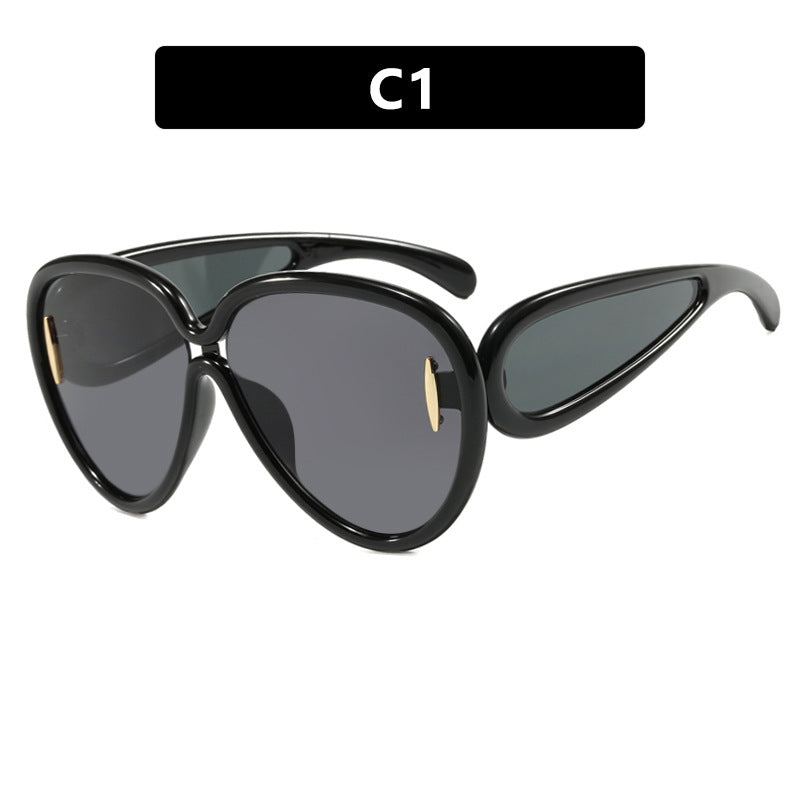 Women extravagant sunglasses in creative design Bowlift