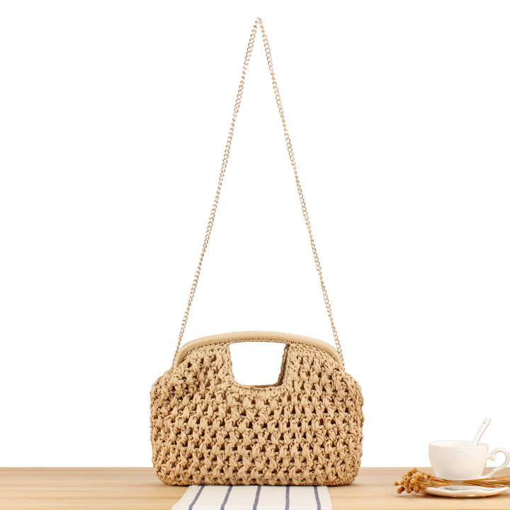 Handbag made of naturally untreated woven material with elegant chain embellishment Bowlift