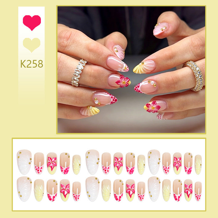 Artificial nail set with floral motifs and elegant embellishments Bowlift