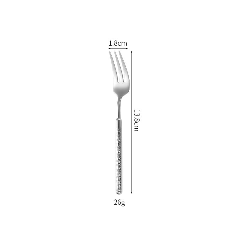 Elegant dessert spoon with elaborate handle design Bowlift