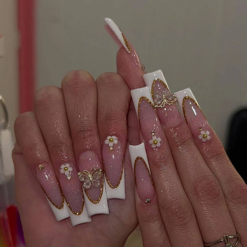 Elegant Gold Accented Stiletto Nail Extensions Bowlift
