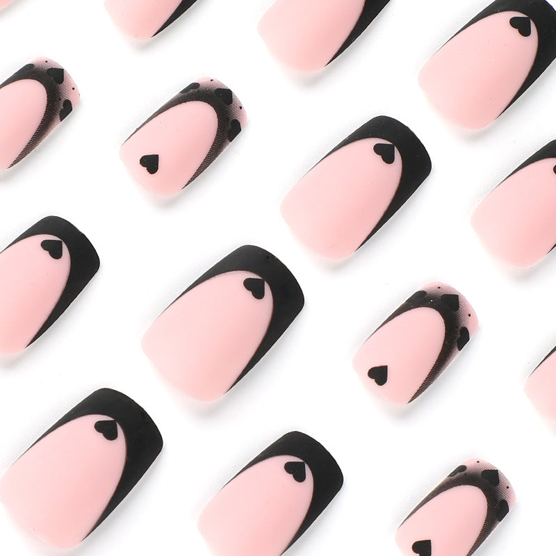 Artful Nail Art with Heart Motifs and Black-White Lace Bowlift