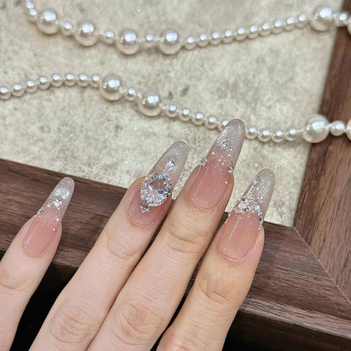 Artificial artificial nails with luxurious glitter and rhinestone design Bowlift