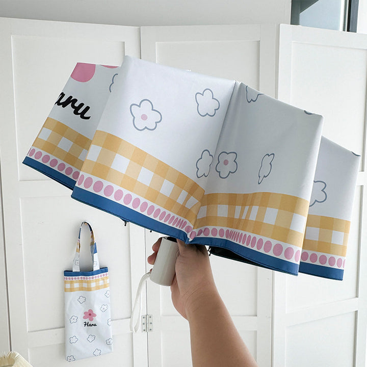 Ladies collapsible umbrella with playful floral pattern Bowlift