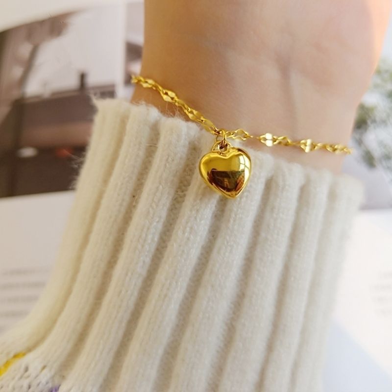 Heart-Shaped Charm Bracelet Bowlift