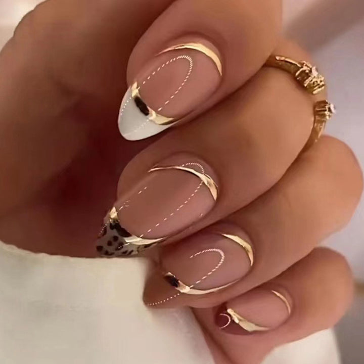 Artful stiletto nails with heart-shaped accents Bowlift