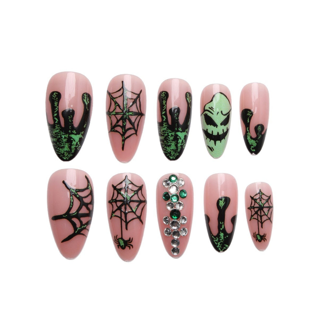 Acrylic nails with Halloween spider design and glitter accents Bowlift