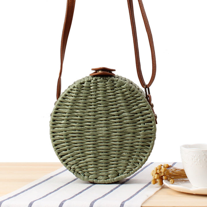 Round basket bag with leather accents Bowlift