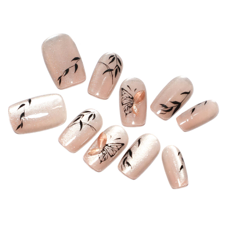 Artificial nail extensions with floral butterfly design Bowlift