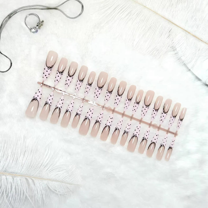 Artificial nail tips with bow pattern Bowlift