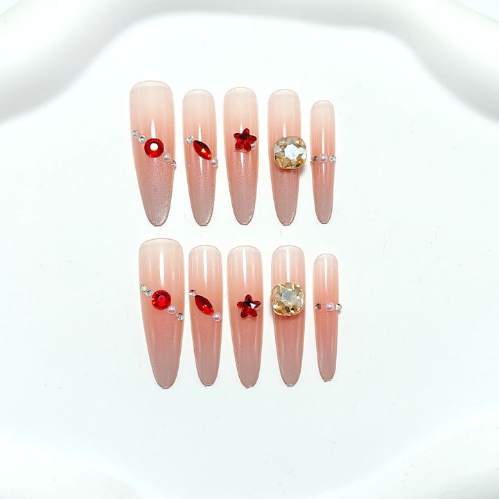 Artificial nails with glamorous decorations Bowlift
