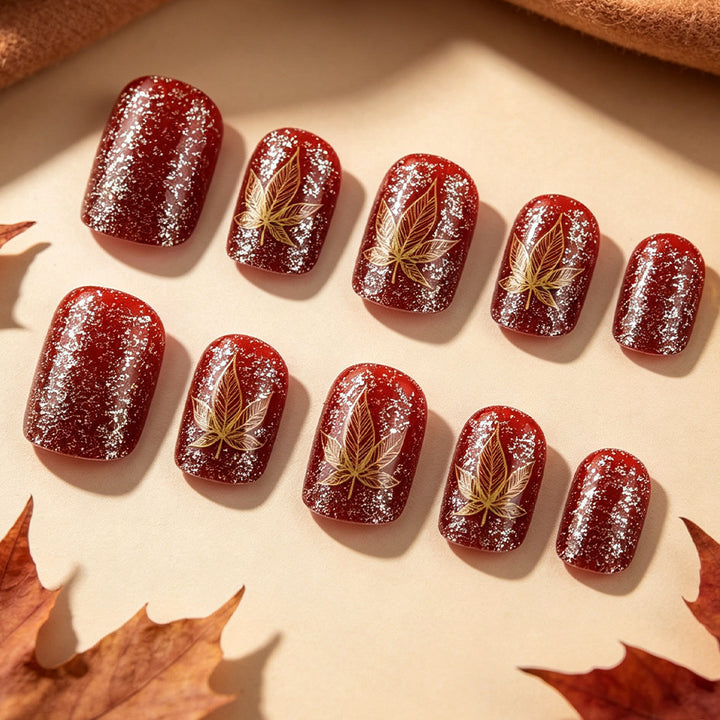 Artistic Leaf-Embellished Nail Art Design Bowlift