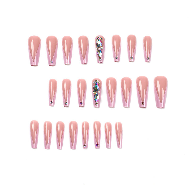Artful nail extensions with rhinestone and flower accents Bowlift