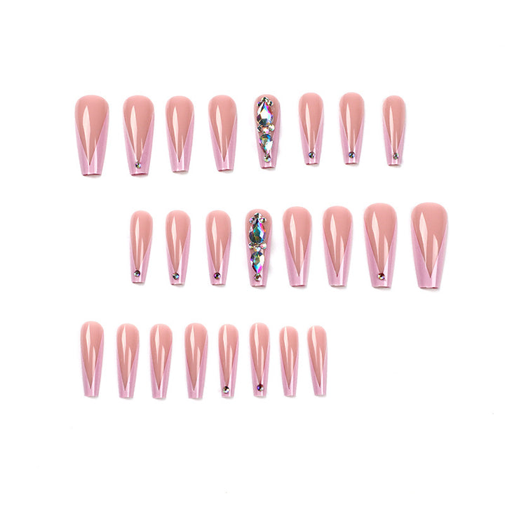 Artful nail extensions with rhinestone and flower accents Bowlift