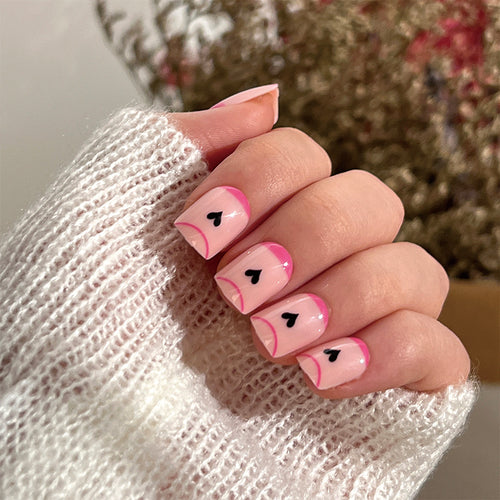 Creative Nail Art with Heart Design and Glitter Accents Bowlift