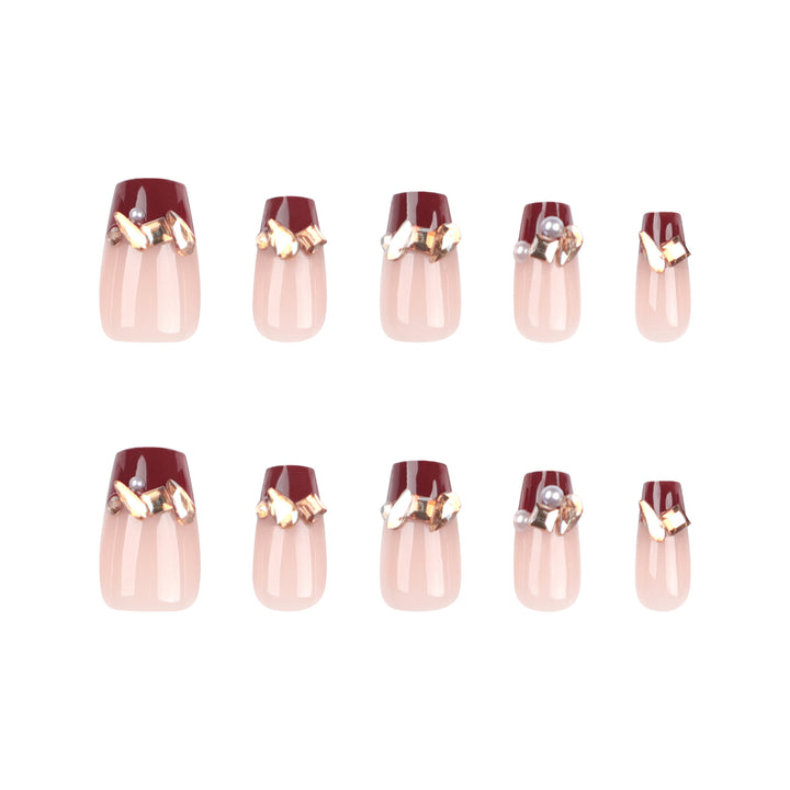 Artful nail extensions with glitter and jewelry embellishments Bowlift