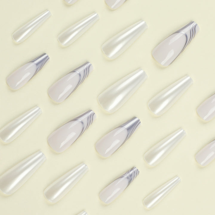 Artificial nail extensions with marbled design Bowlift