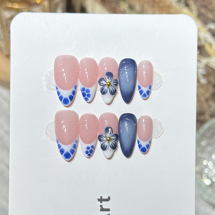 Artistic Press-On Nail Set with Floral and Geometric Accents Bowlift