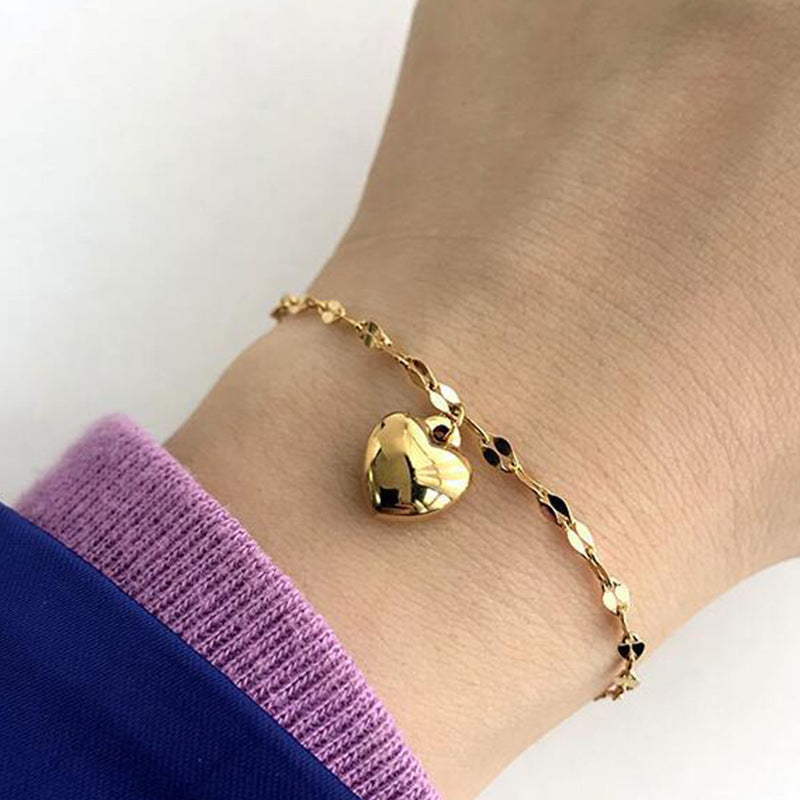 Heart-Shaped Charm Bracelet Bowlift