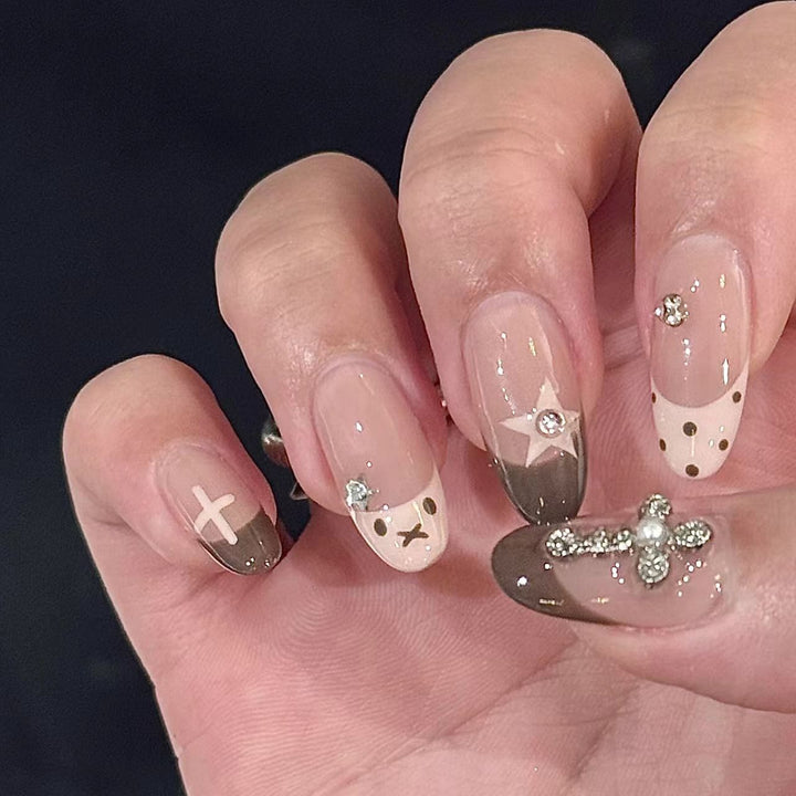Artificial nails with creative design and sparkling accents Bowlift