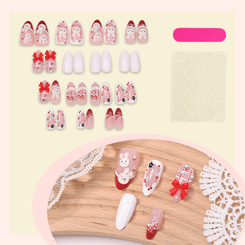 Creative acrylic nail set with playful bunny and gift designs Bowlift