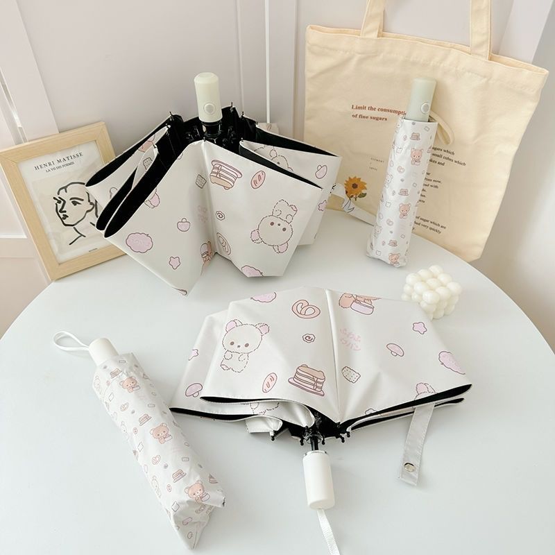 Women's foldable umbrella with playful animal motif Bowlift