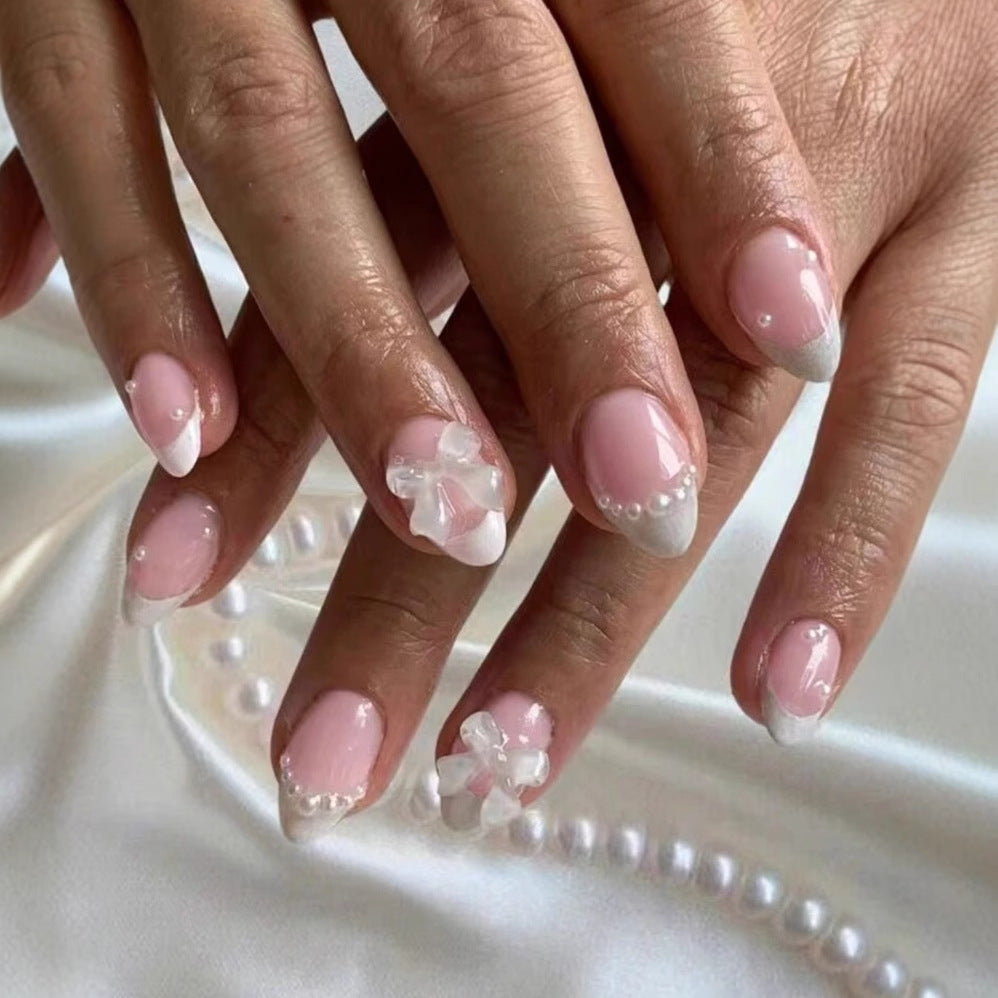 Artificial nail set with exquisite 3D flowers and elegant pearl embellishments Bowlift