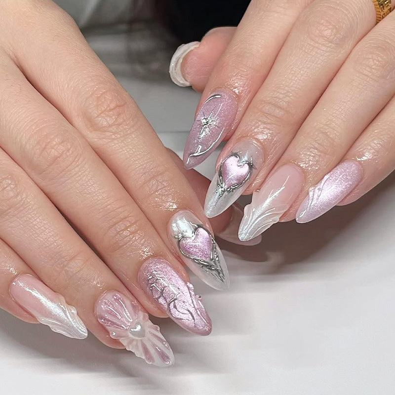 Acrylic nail set with floral accents and glitter embellishments Bowlift