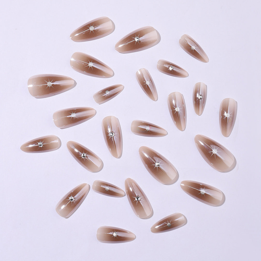 Nail set with elegant rhinestone accents and contoured design Bowlift
