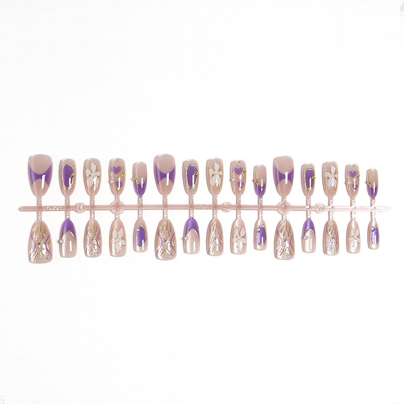 Elegant artificial nails with floral design and color accents Bowlift