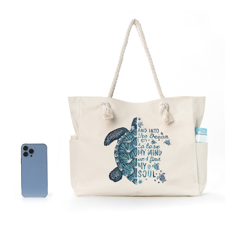 Beach bag with practical side pockets and robust design Bowlift